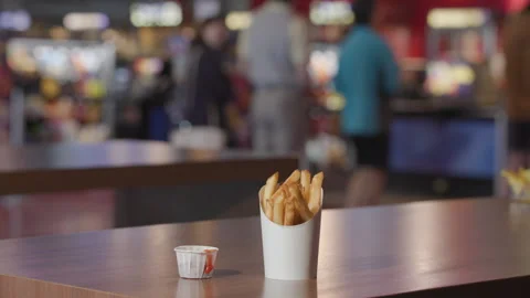 Fries placed on a counter top table Stock Footage 285565420