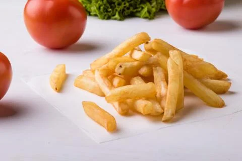 Fries with vegetables Stock Photos