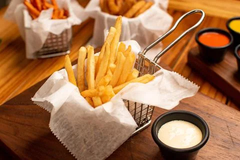 Fries with wood background table Stock Photos