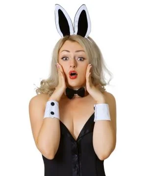 Frightened girl in bunny costume on white background Stock Photos