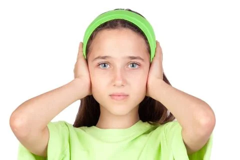 Frightened girl with ears plugged Stock Photos