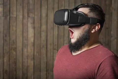 Frightened man with vr. Virtual reality glasses Stock Photos