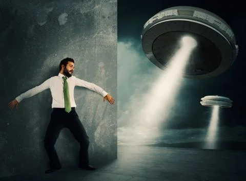Frightened by UFO Stock-Fotos