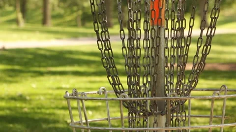 Frisbee Golf Disc Lands in Chains Close Up Stock Footage 52756160