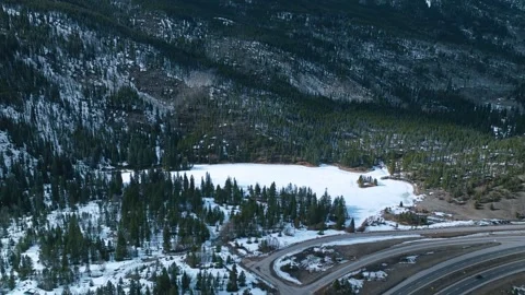 Frisco Gulch wide valley with forest and snow patches 動画素材 334683869