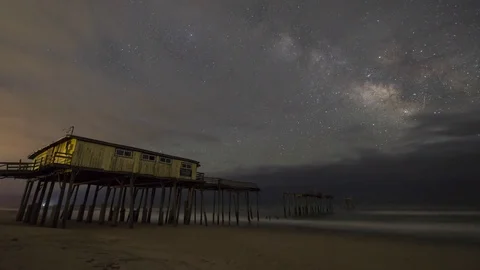 Frisco Pier at night under the clouds and Milky Way Galaxy Vidéo 74978525