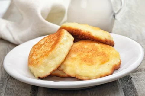 Fritters on rustic table Stock Photos