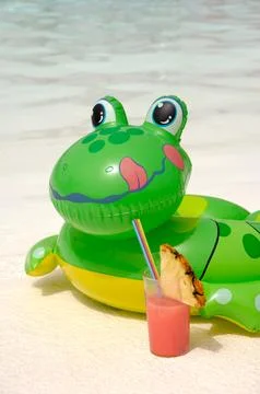 Frog and drink Stock Photos
