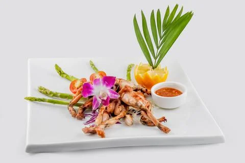 Frog Grill with chilli sauce Stock Photos