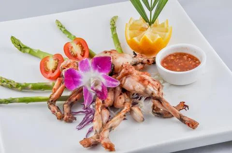 Frog Grill with chilli sauce Stock Photos