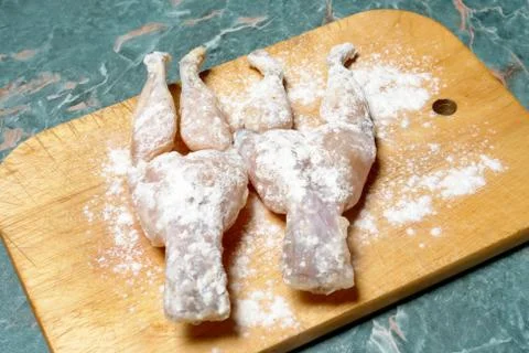 Frog legs Stock Photos