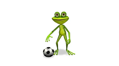 Frog with a soccer ball Stock Footage 38438327