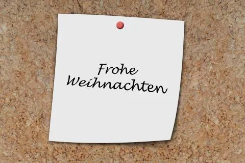 Frohe weihnachten written on a memo 写真素材