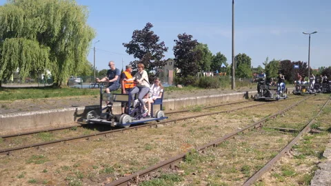 FROMBORK, POLAND - SEPTEMBER 9 2023: Railway bicycle trolleys Stock Footage 268585608
