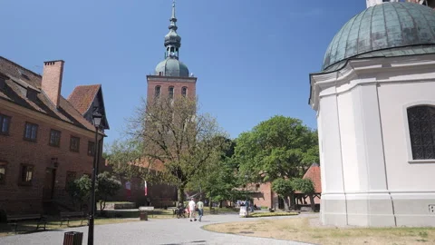 FROMBORK, POLAND - SEPTEMBER 9 2023: Courtyard of Frombork cathedral. Stock Footage 268587218