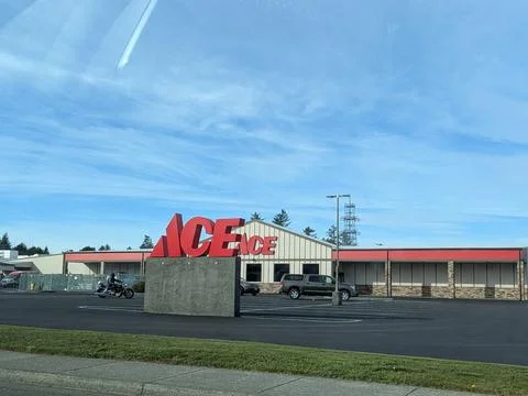 The front of an ACE Hardware store stands bright on a clear day Stock Photos