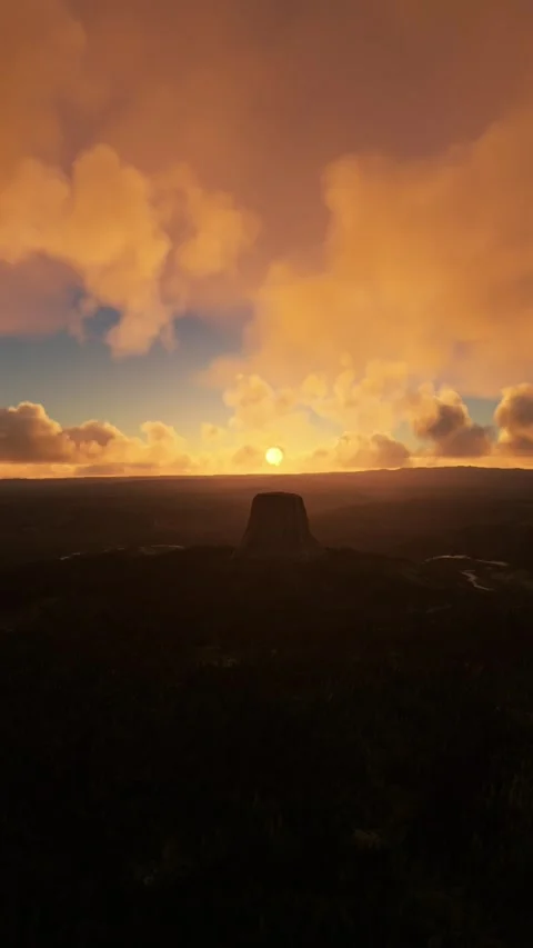 Front aerial view of Devils Tower at sunset in Wyoming Stockbeeldmateriaal 283142322
