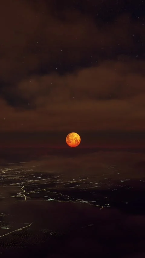 Front Aerial View at Night Flying Over the Clouds with the Full Red Moon Stock Footage 284490189