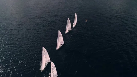 The front aerial view of yachts, racing on the river one each other. yacht Stock Footage 201390014