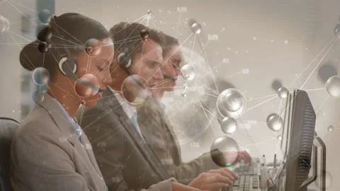 Front agent putting on headset initiating call while network graphic forming Stock Footage 311224737