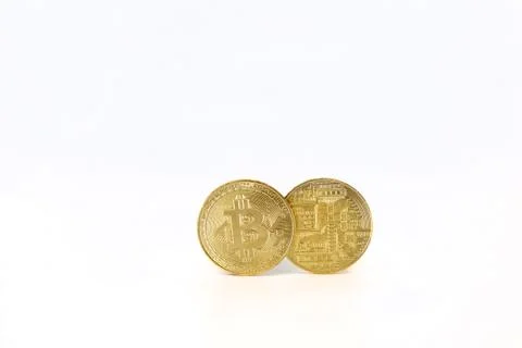 Front and back of Bitcoin token isolated on white background.  Stock Photos