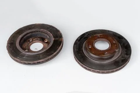 Front and back view of old rusty brake discs Stock Photos