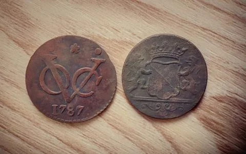 Front and back views of ancient voc coins. Foto stock