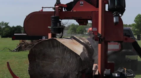 Front angle of large log on portable sawmill Stock Footage 40472069