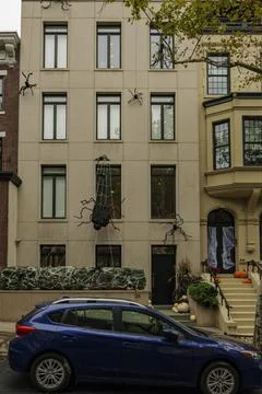 Front of apartment building decorated with spider web for Halloween holiday in Stock Photos
