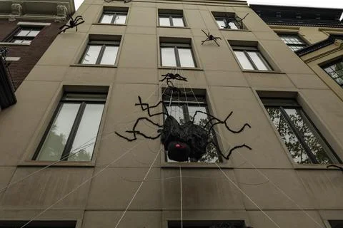 Front of apartment building decorated with spider web for Halloween holiday in Stock Photos