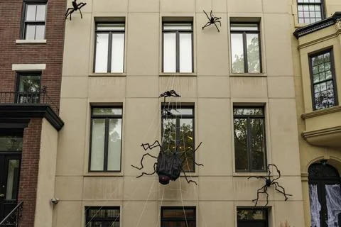 Front of apartment building decorated with spider web for Halloween holiday in Stock Photos