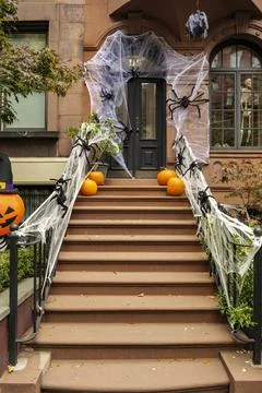 Front of apartment building decorated with spider web for Halloween holiday in Stock Photos