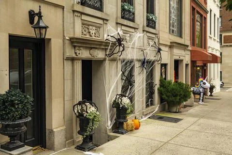 Front of apartment building decorated with spider web for Halloween holiday in Stock Photos