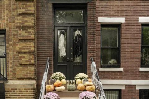 Front of apartment building decorated with spider web for Halloween holiday in Stock Photos