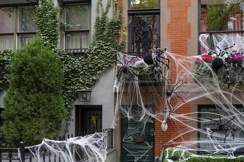 Front of apartment building decorated with spider web for Halloween holiday in Stock Photos