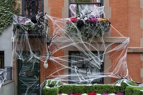 Front of apartment building decorated with spider web for Halloween holiday in Stock Photos