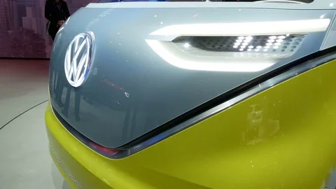 Front area and lights of new Volkswagen Bully prototype at IAA auto show. Stock Footage 80160951