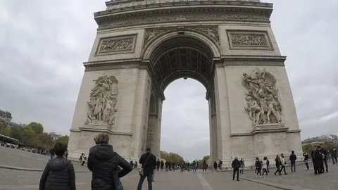 The front area of the Arch de Triomphe and active tourists in slo-mo Stock Footage 88236242