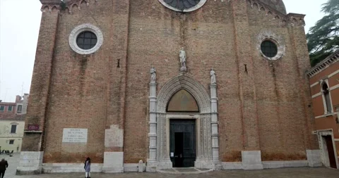Front of Basilica Santa Gloriosa dei Frari catholic church entrance Stock Footage 150156341
