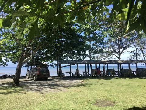 Front beach view with cottages Stock Photos