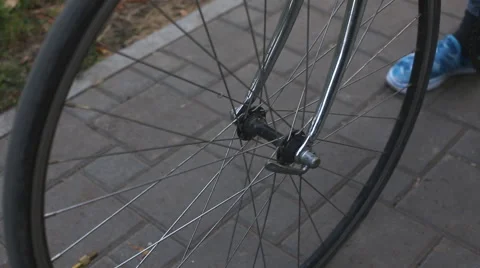 Front bicycle wheel closeup Stock Footage 54409440