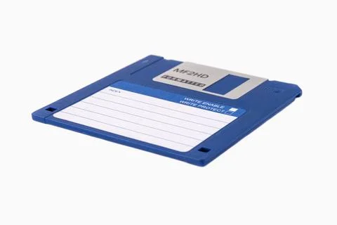 The front of an blue floppy disk, isolated on a white background 写真素材