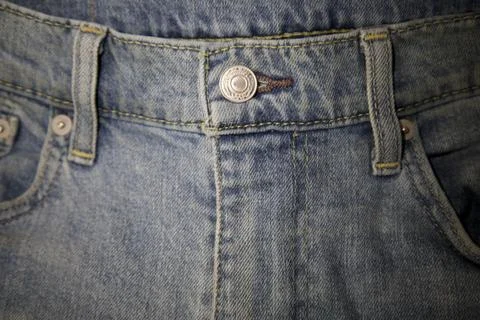 Front of blue jeans with button and belt loops Foto stock