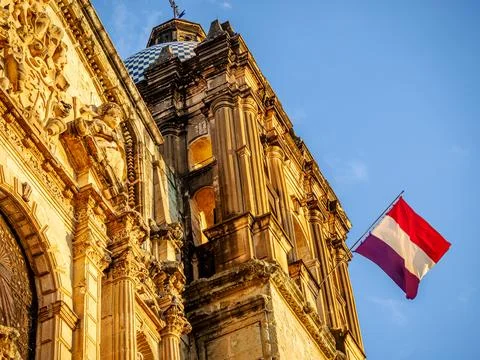 Front of the building in the rays of the setting sun Stock Photos