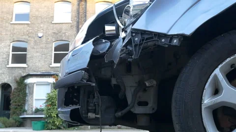 Front bumper and fender damage on a car following a collision.  Stock Footage 342047733