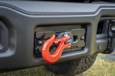 Front bumper with a winch of offroad SUV, camper van or truck Stock Photos