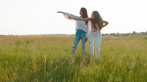 In front of the camera attractive charismatic happy ladies enjoy the landscape Stock Footage 166850536