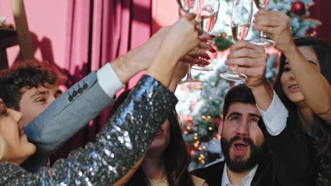 In front of the camera beautiful group of friends celebrating a new year party Video stock 139488414