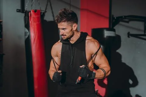 In front of the camera charismatic guy with a brutal face after his workout Stock Photos