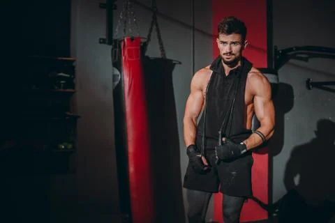 In front of the camera charismatic guy with a brutal face after his workout Stock Photos